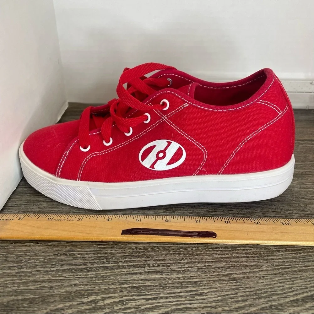 Heelys Red Sneakers with White Logo. Size 7.Skate shoes. Used- has marks.